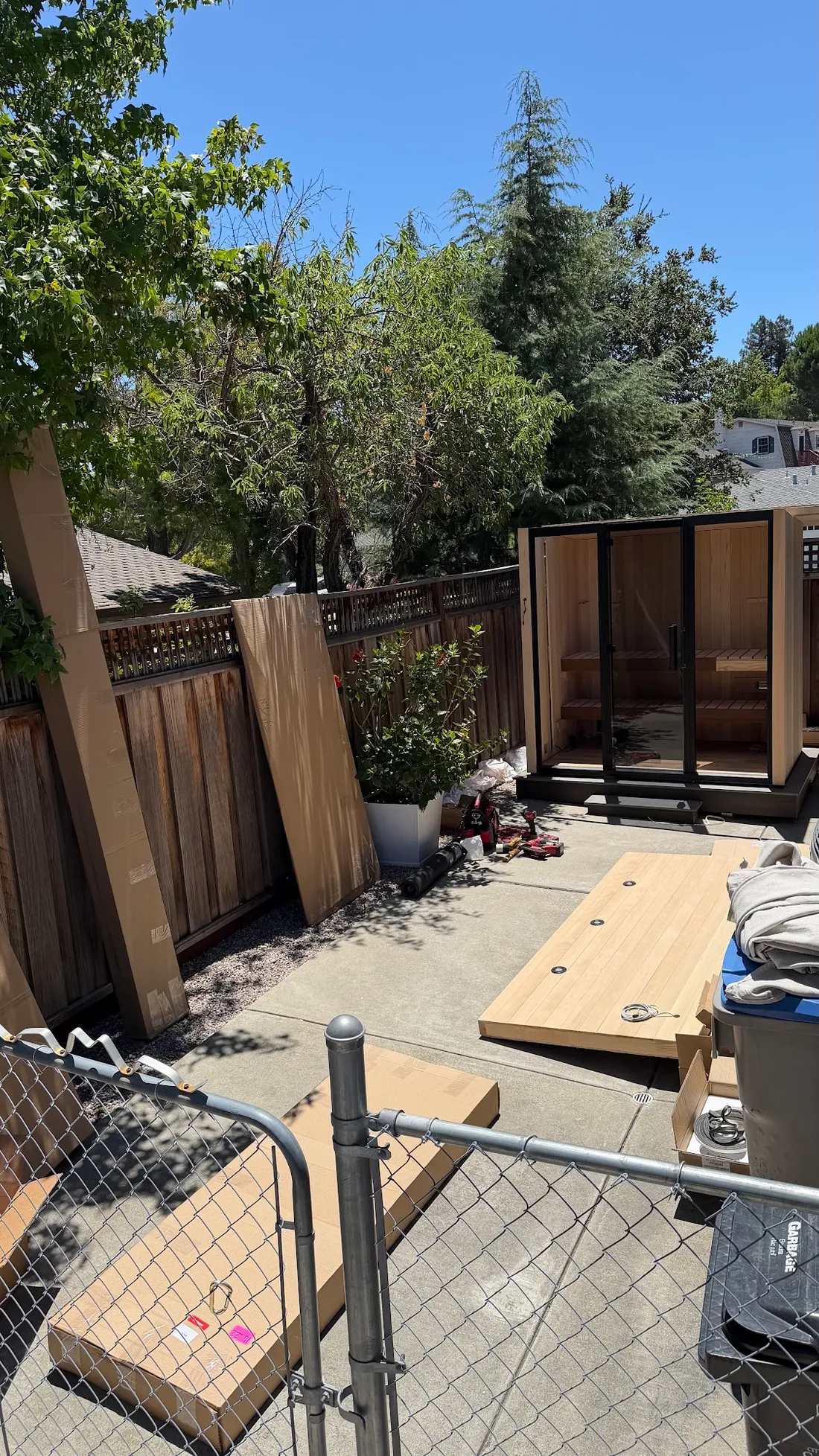 A sauna being assembled in a side yard, San Jose